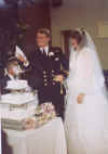 dani_salcuttingcake.jpg (87045 bytes)